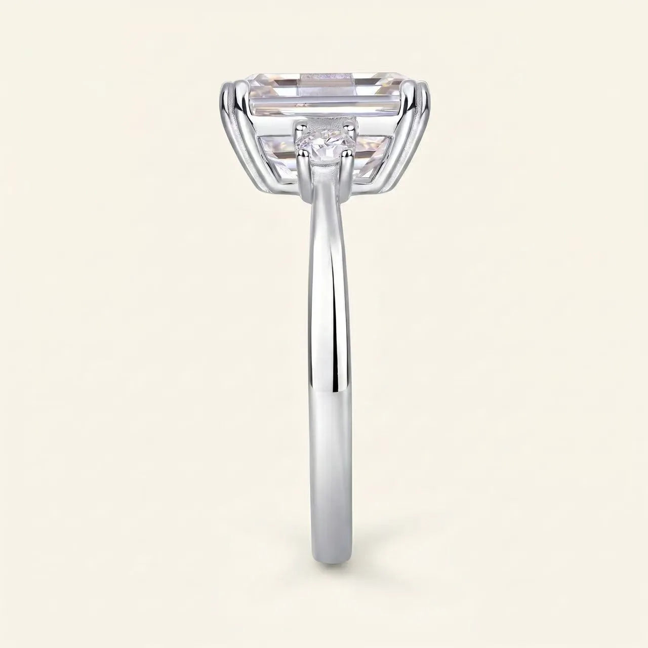 4 Carat Emerald Cut Three-Stone Ring