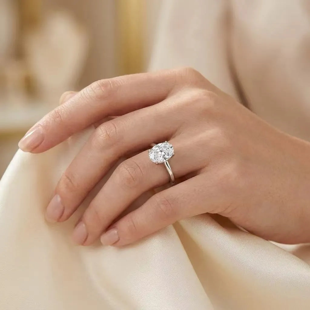 3.5 carat oval cut moissanite ring worn on hand