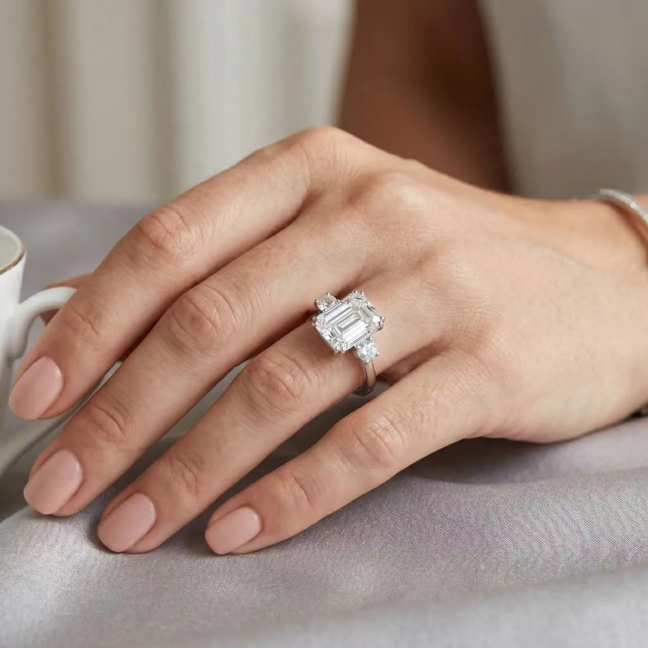 4 Carat Emerald Cut Three-Stone Ring