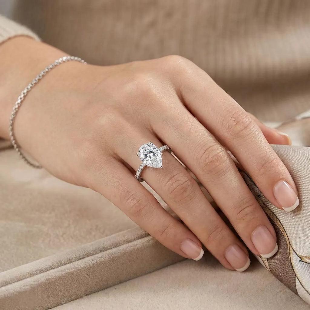 4 Carat Pear Cut Pavé Ring