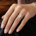 Marquise cut moissanite engagement ring worn on hand