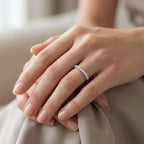 Moissanite half eternity ring worn on hand